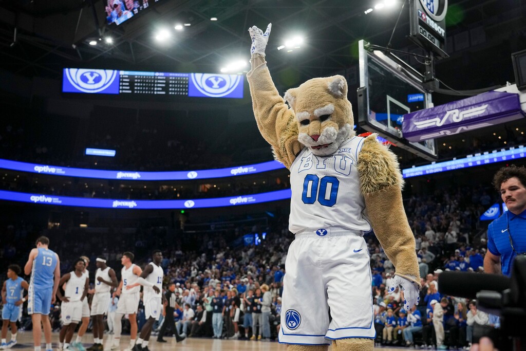 (Bethany Baker  |  The Salt Lake Tribune) Cosmo, the BYU Cougars mascot, gestures during the game between the BYU Cougars and the North Carolina Tar Heels at Delta Center on Friday, Oct. 24, 2025.