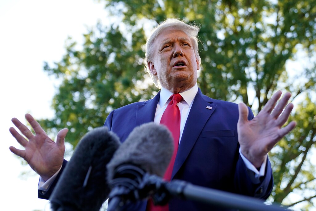 (Andrew Harnik | AP)  President Donald Trump speaks to reporters on the South Lawn of the White House, Monday, Sept. 21, 2020, before leaving for a short trip to Andrews Air Force Base, Md., and then onto Ohio for rallies.