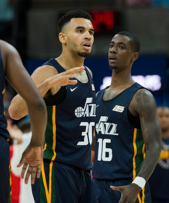 (Rick Egan  |  The Salt Lake Tribune)      Utah Jazz guard Naz Mitrou-Long (30) and Utah Jazz guard Thomas Wilder (16) celebrate as the Jazz close the lead to 3, in Utah Jazz summer league action between Utah Jazz and Memphis Grizzlies in Salt Lake City, Tuesday, July 3, 2018.