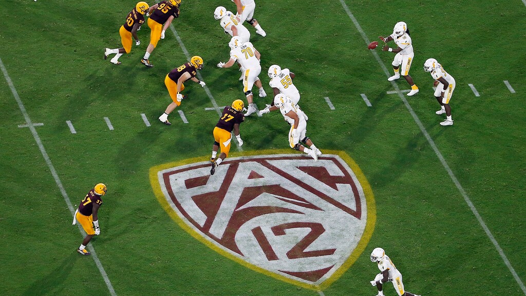 FILE - This Thursday, Aug. 29, 2019, file photo, shows the Pac-12 logo during the second half of an NCAA college football game between Arizona State and Kent State, in Tempe, Ariz. The Pac-12 has set Sept. 26 as the start of its 10-game conference-only football schedule. The Pac-12 announced three weeks ago it would eliminate nonconference games for its 12 member schools. (AP Photo/Ralph Freso, File)