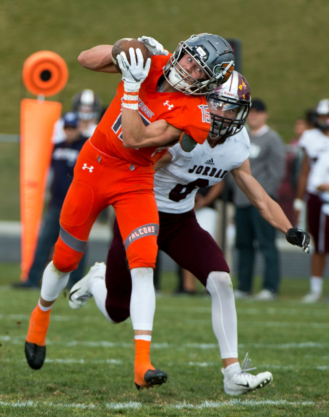 (Rick Egan  |  The Salt Lake Tribune)   Ty Arrington hauls in a pass, as Quentin Kafentzis  defends for Jordan, in prep 5A playoff action between Jordan High and Skyridge High, in Lehi, Friday, Nov. 2, 2018.
