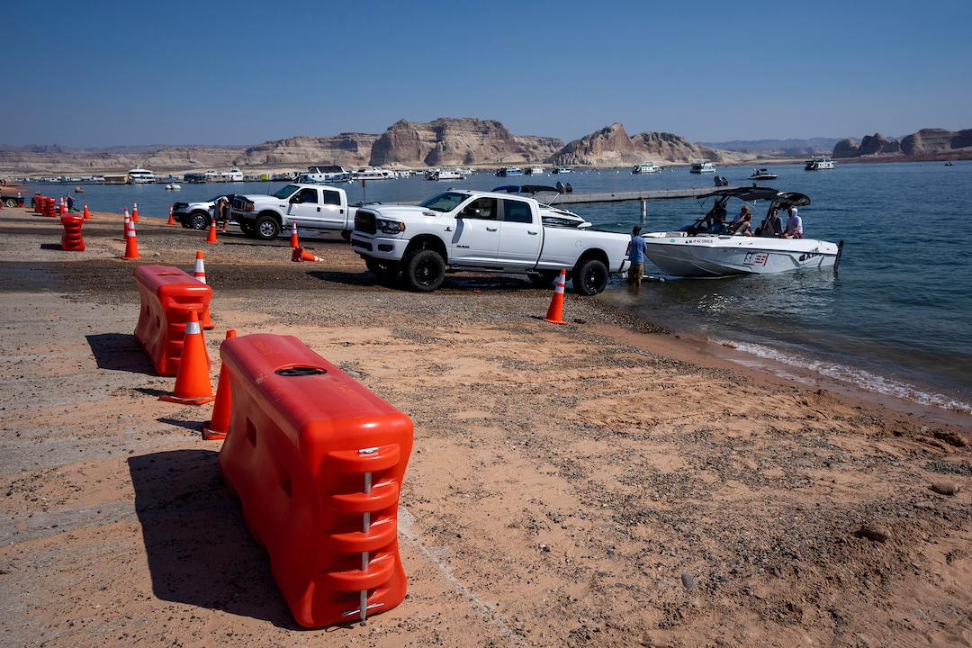 (Rick Egan | The Salt Lake Tribune)  Boats are launched at one of the extended ramps, at Wahweap Marina, on Lake Powell, on Tuesday, Aug. 3, 2021.