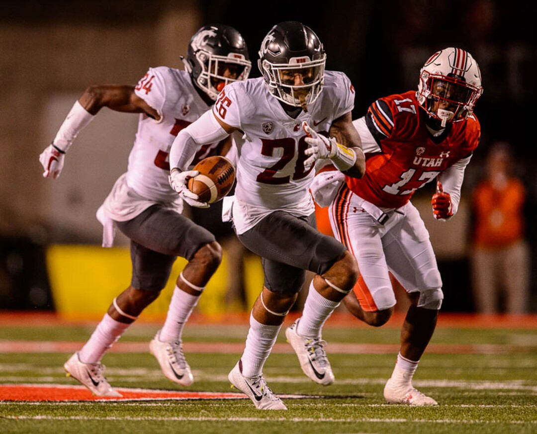 (Trent Nelson | The Salt Lake Tribune)  Washington State Cougars safety Hunter Dale (26) runs after an interception as the University of Utah hosts Washington State, NCAA football in Salt Lake City, Saturday November 11, 2017.