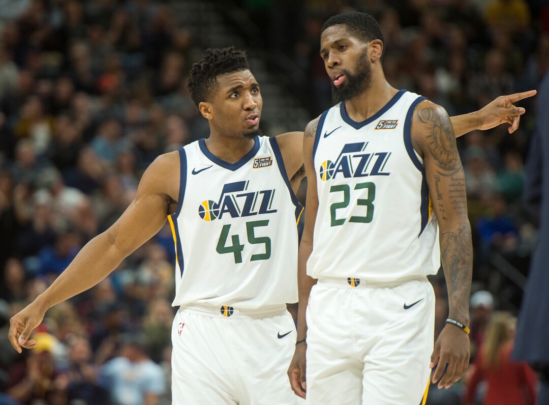 (Rick Egan  |  The Salt Lake Tribune)  Utah Jazz guard Donovan Mitchell (45) talks to Utah Jazz forward Royce O'Neale (23) during a break in the action, in NBA action Utah Jazz vs San Antonio Spurs in Salt Lake City, Monday, February 12, 2018.