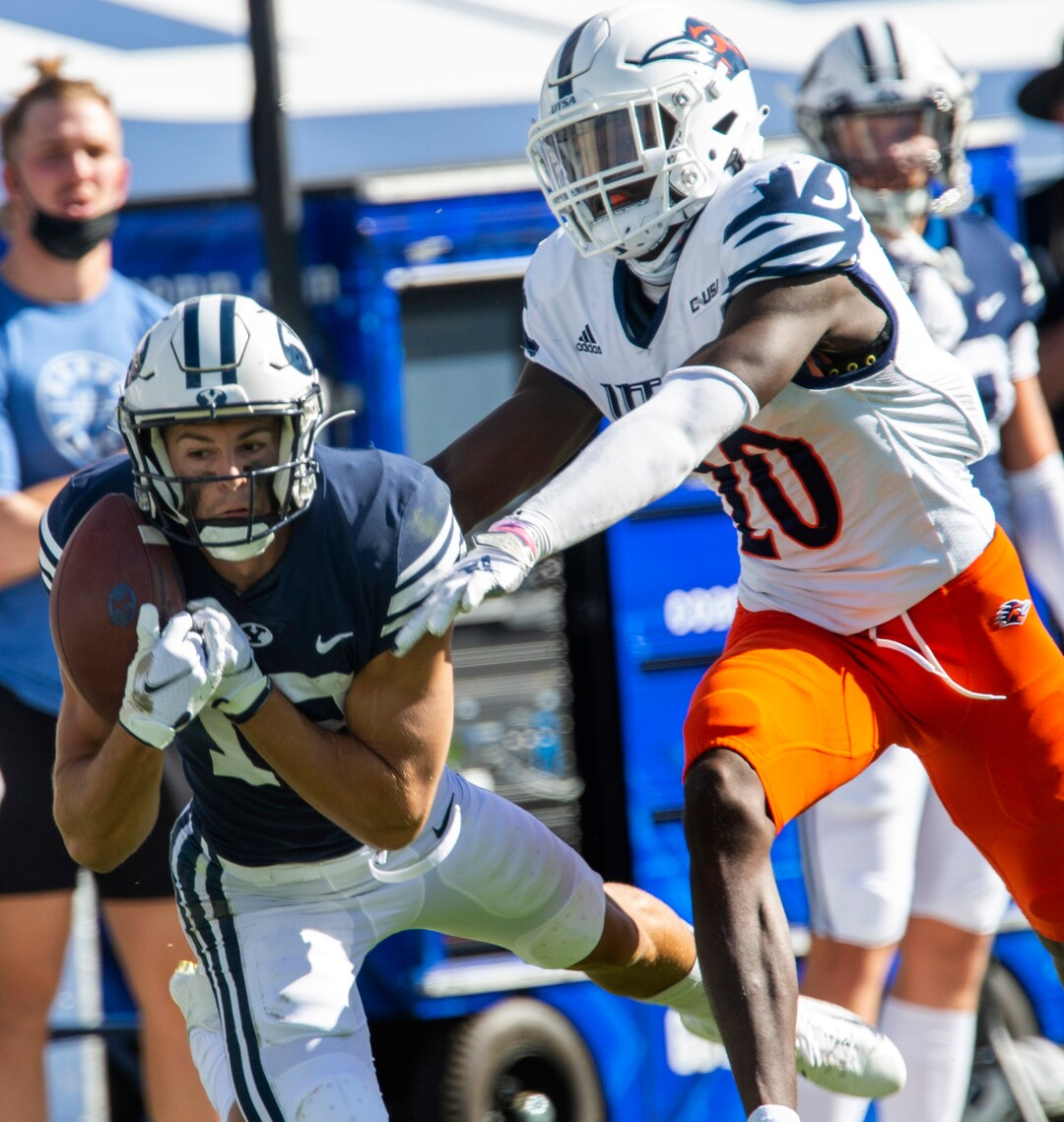 (Rick Egan  |  The Salt Lake Tribune)    Brigham Young Cougars wide receiver Gunner Romney tries to hang on a long pass, as UTSA Roadrunners cornerback Tariq Woolen (20) defends, in football action between the Brigham Young Cougars and the UTSA Roadrunners, at Lavell Edwards stadium, Saturday, Oct. 10, 2020.