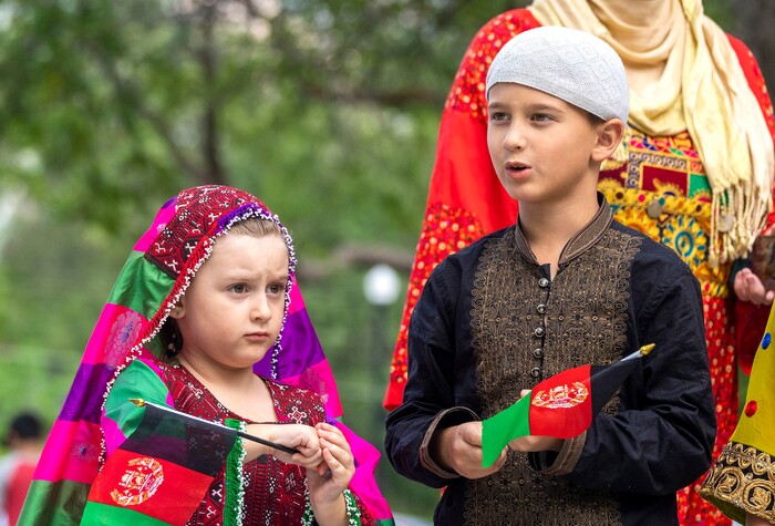 (Rick Egan | The Salt Lake Tribune) 
Muhammad-Ali Mustafawi and Aiza Mustafawi gather at Murray Park for a prayer vigil in honor of UtahÕs Afghan refugees, onSaturday, Aug. 21, 2021.