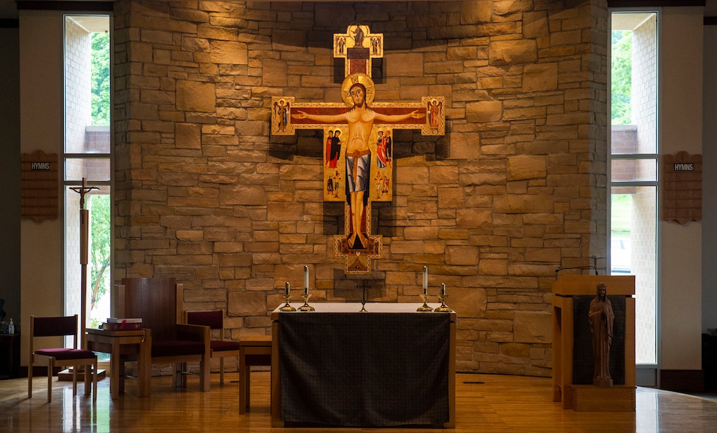 (Rick Egan  |  The Salt Lake Tribune)      St. Catherine of Siena Catholic Newman Center installed a new cross above its main altar. It's a replica of an icon-style cross originally painted centuries ago, depicting how Catherine of Siena saw Christ with the stigmata. Thursday, Aug. 8, 2019.