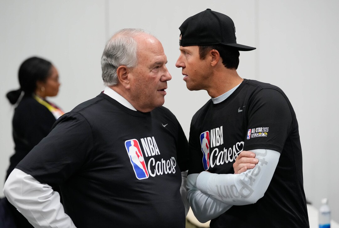 (Francisco Kjolseth | The Salt Lake Tribune) Apostle Ronald A. Rasband speaks with Utah Jazz owner Ryan Smith during the NBA Cares Day of Service in Salt Lake City on Feb. 17, 2023.