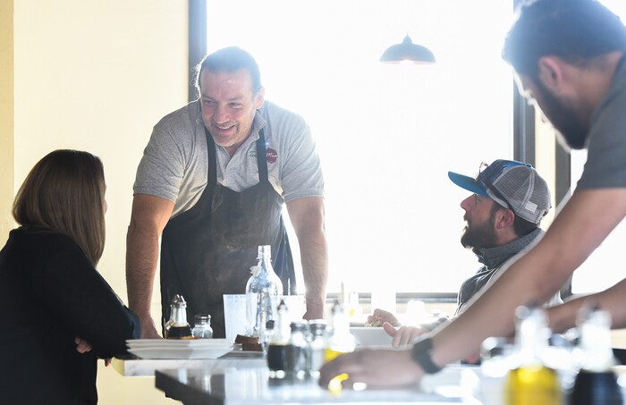 (Francisco Kjolseth | The Salt Lake Tribune) Ernesto Lo Russo, chef and owner of Terra Mia Italian restaurant in Draper, a sister restaurant to Terra Mia in Orem, converses with customers during a recent lunch hour.