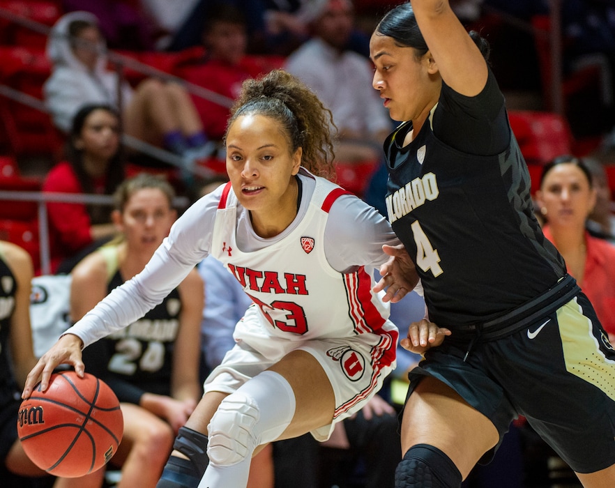 (Rick Egan | The Salt Lake Tribune) Utah guard Daneesha Provo (23) works the ball inside in Pac-12 basketball action against the Colorado Buffaloes at the Jon M. Huntsman Center, Sunday, Dec. 29, 2019.