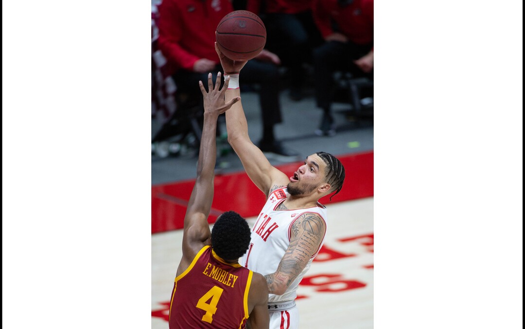 (Francisco Kjolseth  | The Salt Lake Tribune) Utah Utes forward Timmy Allen (1) drives the ball past USC Trojans forward Evan Mobley (4) in PAC-12 basketball action at the Jon M. Huntsman Center, on Saturday, Feb. 27, 2021.