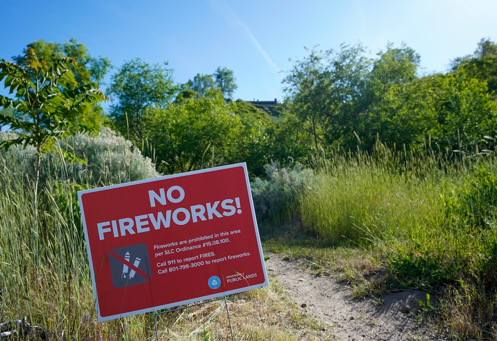 (Chris Samuels | The Salt Lake Tribune) A sign warning against fireworks at the Lower City Creek trailhead in 2025. Some wonder if fireworks should be banned completely this July.