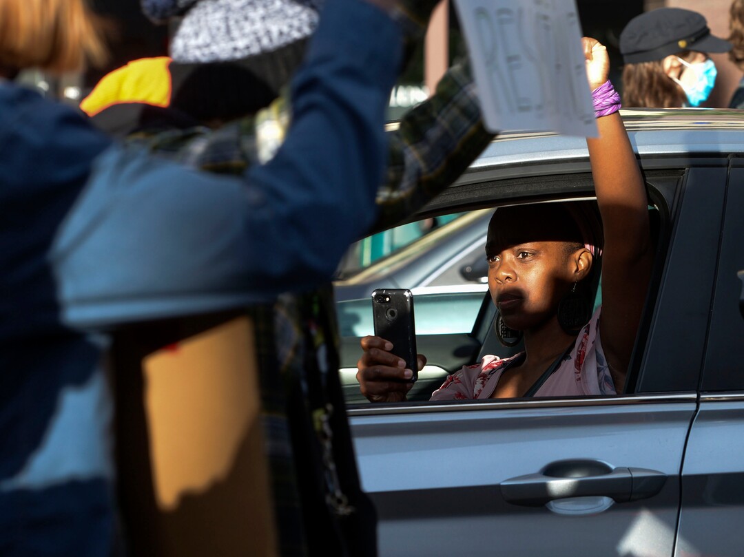 (Leah Hogsten  |  The Salt Lake Tribune) Demonstrators marched from the Utah Capitol down State Street, stopping at every intersection for five minutes in honor of George Floyd, June 8, 2020.