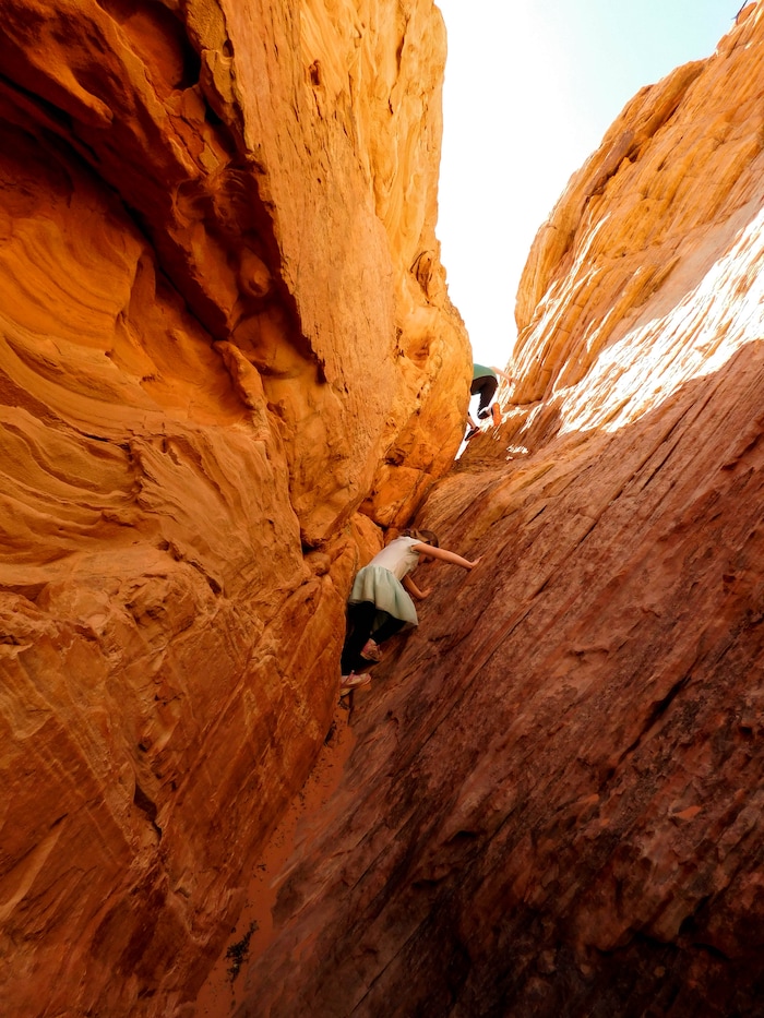 Erin Alberty  |  The Salt Lake Tribune

Hikers climb between fins of sandstone near the Sand Cove campground March 12, 2017 in the Red Cliffs Desert Reserve near Leeds.