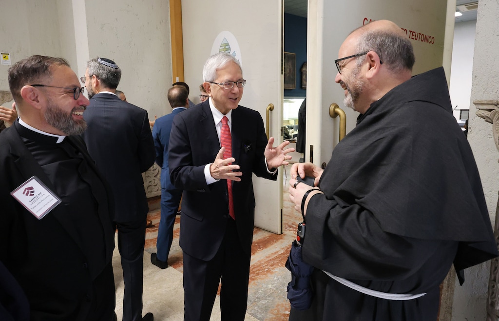 (The Church of Jesus Christ of Latter-day Saints) Apostle Gerrit W. Gong, center, talks with Father Paolo Benanti, right, and Father John Paul Kimes during a summit on A.I. ethics in Rome on Tuesday, Oct. 21, 2025.
