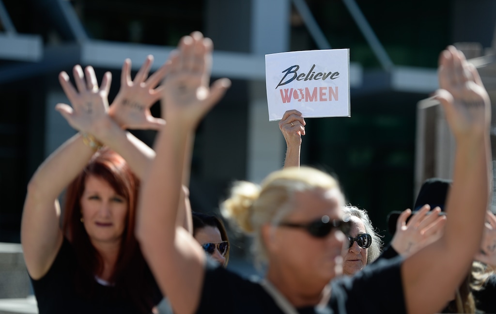 (Francisco Kjolseth  |  The Salt Lake Tribune)  A group of mostly women show up at the Wallace F. Bennett Federal Building to protest against Supreme Court nominee Judge Brett Kavanaugh on Thursday, Sept. 27, 2018.