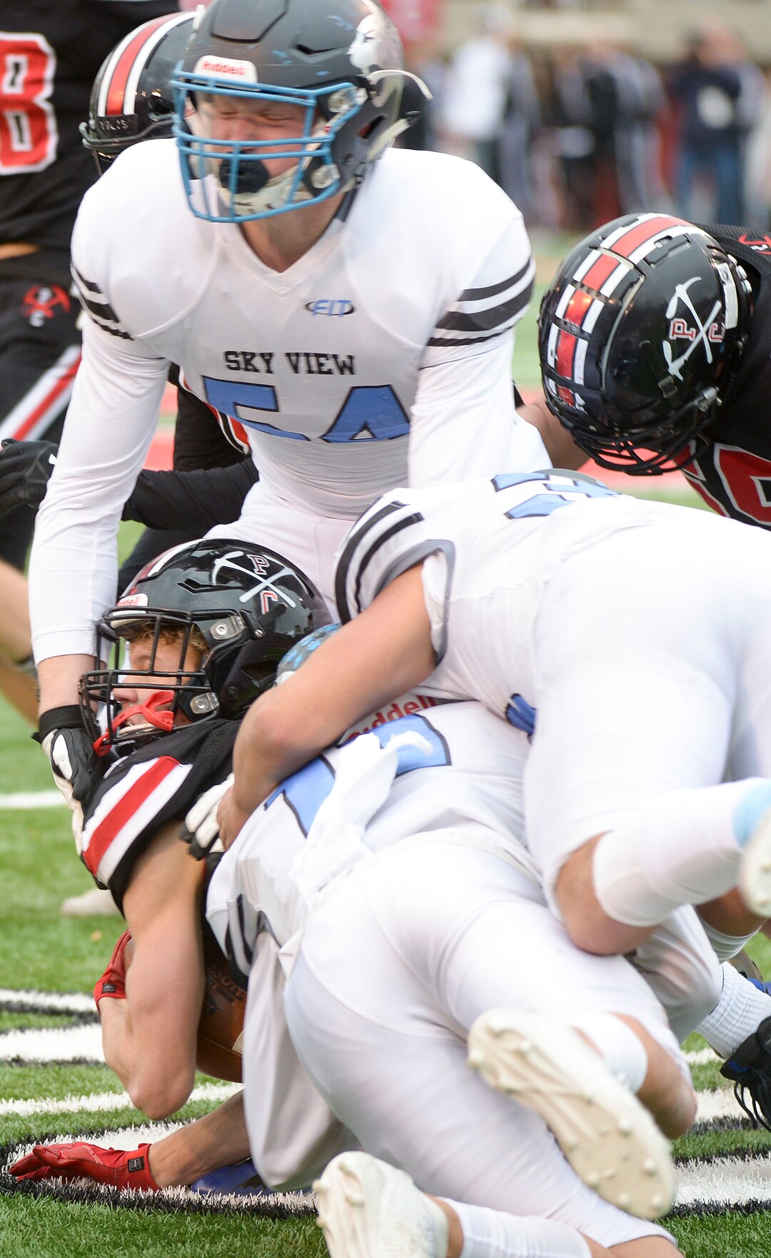 (Leah Hogsten  |  The Salt Lake Tribune) Park CityÕs Franklin Paas runs into the knee of Sky ViewÕs Bracken Schumann.  Sky View High School defeated Park City 35-0 to win the 4A State Championship football title, Nov. 11, 2019 at Rice-Eccles Stadium.