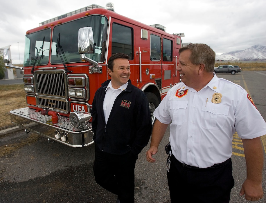 (Al Hartmann  |  Salt Lake Tribune) Unified Fire Authority Chief Michael Jensen, left, and Deputy Chief Gaylord Scott are named in a new lawsuit alleging they hired their own family members over more qualified candidates.