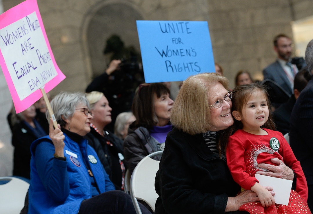(Francisco Kjolseth  |  The Salt Lake Tribune)  Alyce Brannan holds her granddaughter Ella Lucero, 4, as they watch local supporters of the Equal Rights Amendment rally at the Utah Capitol on Tuesday, Dec. 3, 2019, to encourage Utah to ratify the ERA.