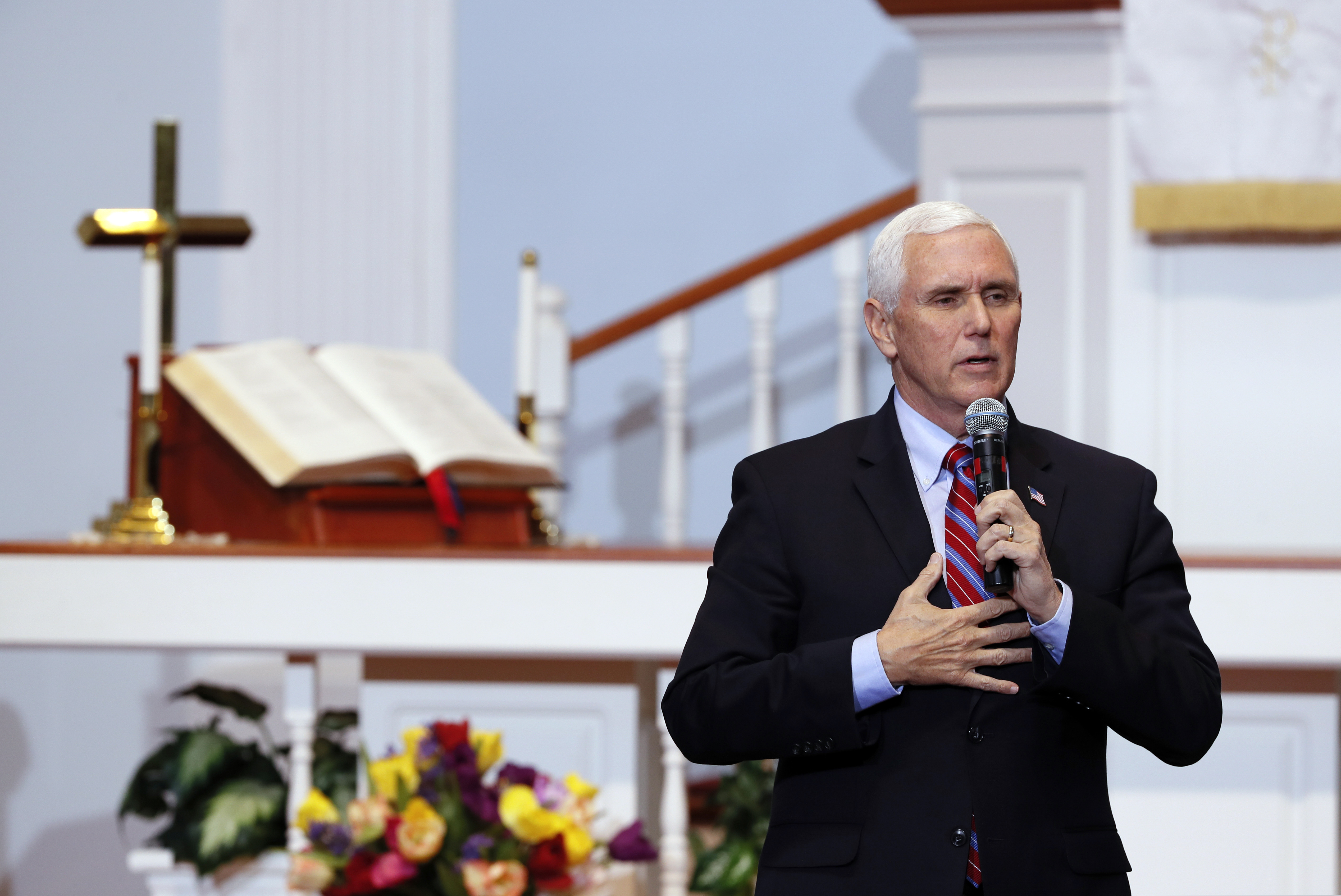 (Charlie Neibergall | The Associated Press) Vice President Mike Pence speaks during a discussion with local faith leaders to encourage them to resume in-person church services in a responsible fashion in response to the coronavirus pandemic, Friday, May 8, 2020, in Urbandale, Iowa. Pence is self-isolating after coming in contact with an aide who tested positive for the coronavirus.