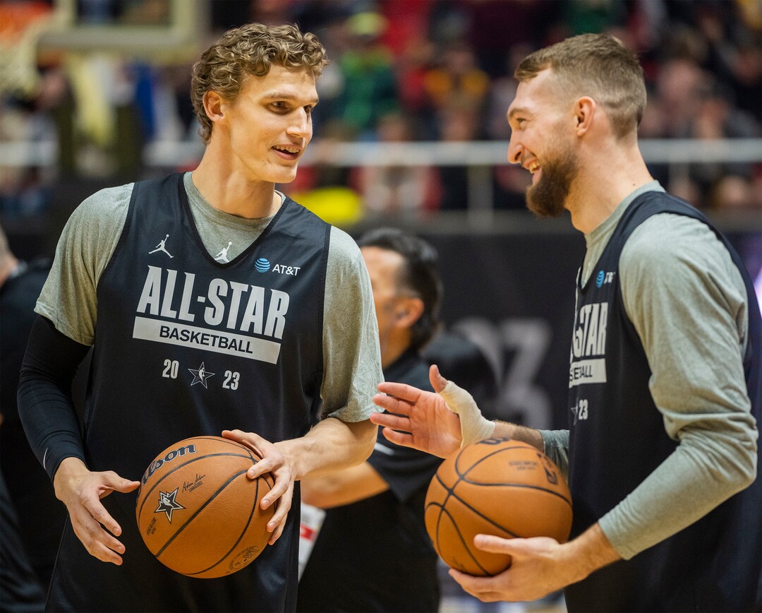 (Rick Egan | The Salt Lake Tribune) Lauri Markkanen visits with Sacramento Kings Domantas Sabonis, during the Western team All-Star Practice at the Jon M. Huntsman Center, on Saturday, Feb. 18, 2023.