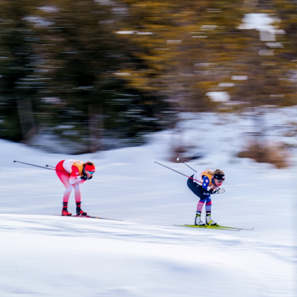 (Trent Nelson | The Salt Lake Tribune) USA’s Novie McCabe, right, competes in the cross-country skiing women’s 4 x 5km relay at the 2022 Winter Olympics in Zhangjiakou, China, on Saturday, Feb. 12, 2022. McCabe is part of a University of Utah ski team looking to repeat as national champs this week.