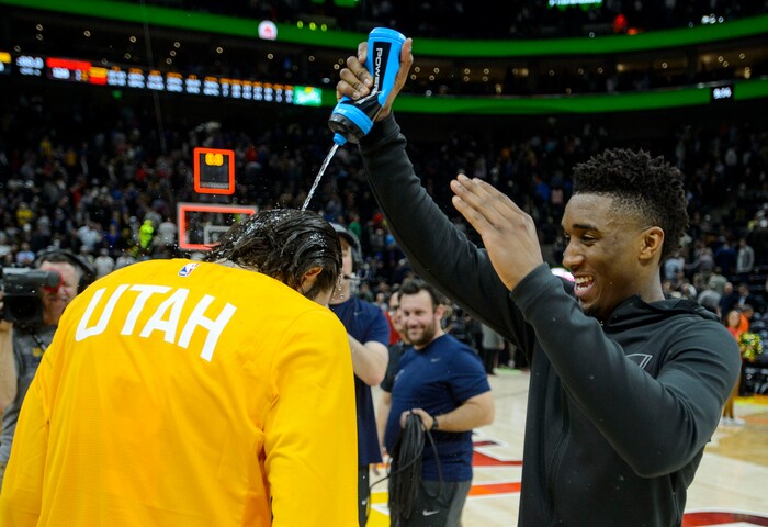 (Steve Griffin  |  The Salt Lake Tribune) Utah Jazz guard Donovan Mitchell (45) soaks Utah Jazz guard Ricky Rubio (3) with a water bottle after the Jazz defeated the Golden State Warriors at Vivint Smart Home Arena in Salt Lake City Tuesday January 30, 2018.