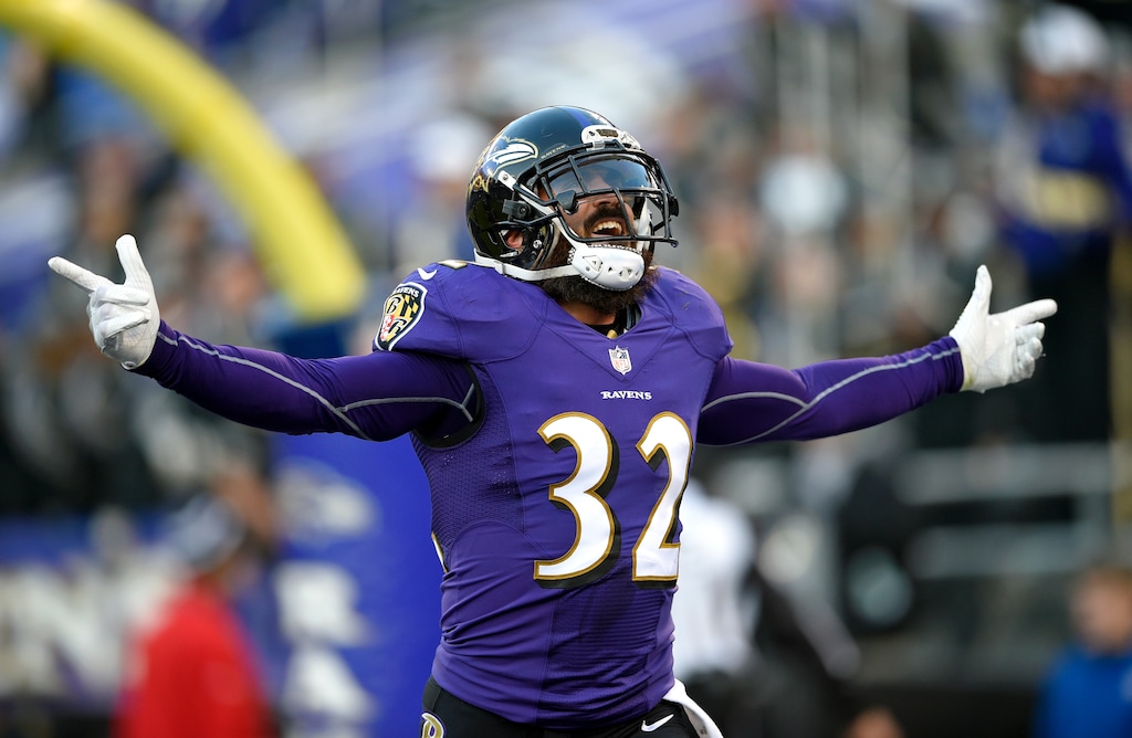 Baltimore Ravens free safety Eric Weddle celebrates after running an intercepted pass back for a touchdown in the second half of an NFL football game against the Detroit Lions, Sunday, Dec. 3, 2017, in Baltimore. (AP Photo/Nick Wass)
