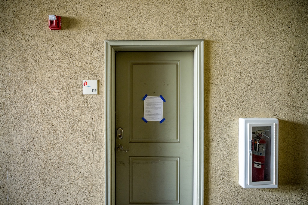 (Trent Nelson  |  The Salt Lake Tribune) A legal notice on the door of a Layton apartment leased to the Brighter Adoptions director on Thursday, Feb. 26, 2026.