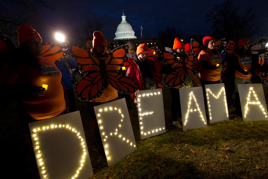 Demonstrators rally in support of Deferred Action for Childhood Arrivals (DACA) during a rally outside of the Capitol Sunday, Jan. 21, 2018, in Washington. (AP Photo/Jose Luis Magana)