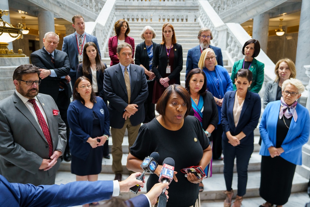 (Trent Nelson  |  The Salt Lake Tribune) Rep. Sandra Hollins, D-Salt Lake City, speaks, standing with other House Democrats who walked out of the House Chamber as Republicans moved to debate resolution on teaching critical race theory in Salt Lake City on Wednesday, May 19, 2021.