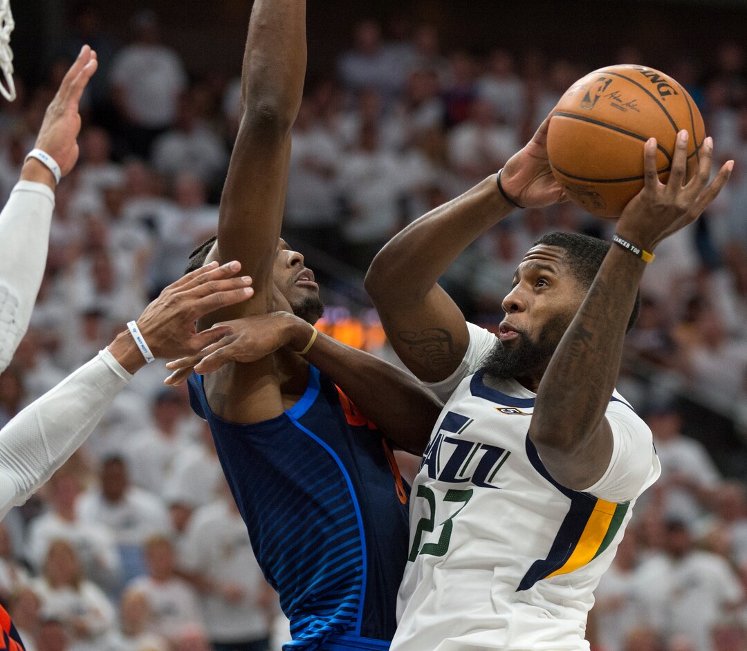 (Rick Egan  |  The Salt Lake Tribune)    Utah Jazz forward Royce O'Neale (23) goes up for a shot as Oklahoma City Thunder forward Jerami Grant (9) defends, in game 4, NBA playoff action between Utah Jazz and Oklahoma City Thunder, in Salt Lake City, Monday April 23, 2018.
