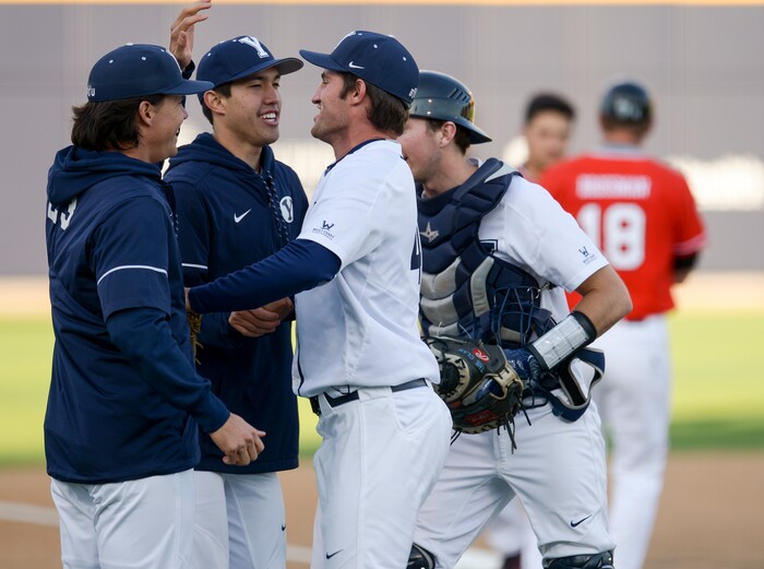 (Leah Hogsten  |  The Salt Lake Tribune) BYU pitcher Kendall Motes celebrates a scoreless inning with teammates as Brigham Young University hosts University of Utah at Miller Park, Tuesday, April 24, 2018 in Provo.
