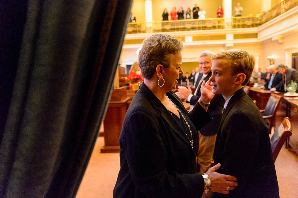 (Trent Nelson | The Salt Lake Tribune)  Camille Neider is embraced by her son Cooper in the Senate Chamber in Salt Lake City after being confirmed by the Senate to be a judge in the Second District Court, Wednesday December 20, 2017.