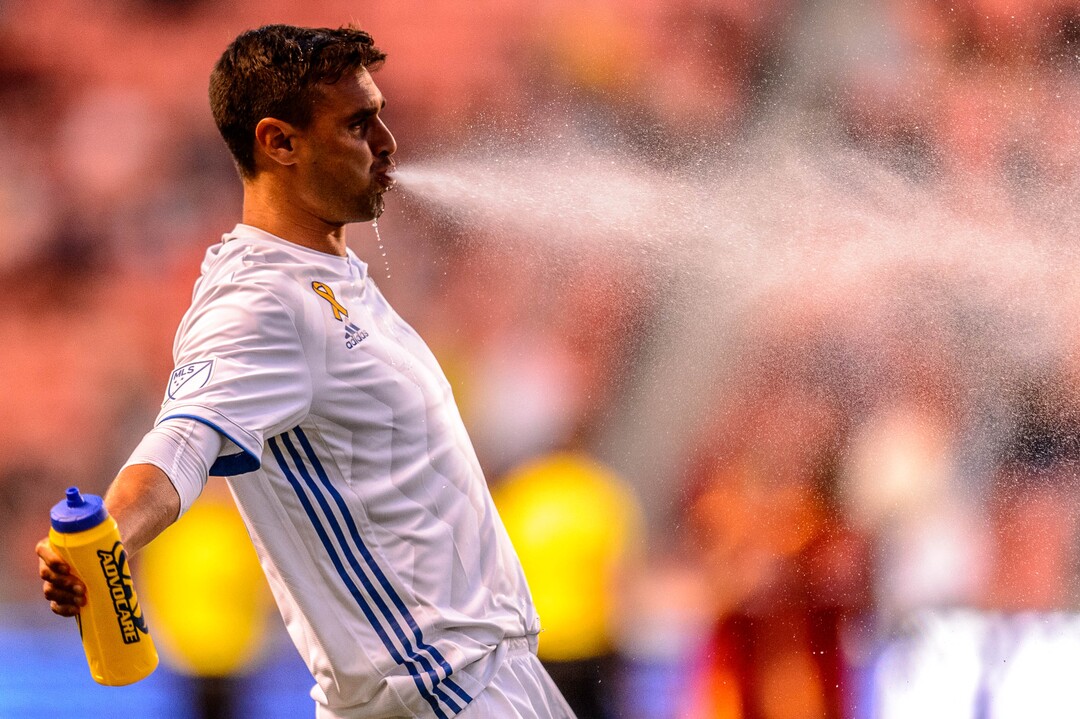 (Trent Nelson  |  The Salt Lake Tribune)  San Jose Earthquakes forward Chris Wondolowski (8) sprays water as he takes the field as Real Salt Lake hosts the San Jose Earthquakes, MLS soccer at Rio Tinto Stadium in Sandy on Wednesday Sept. 11, 2019.