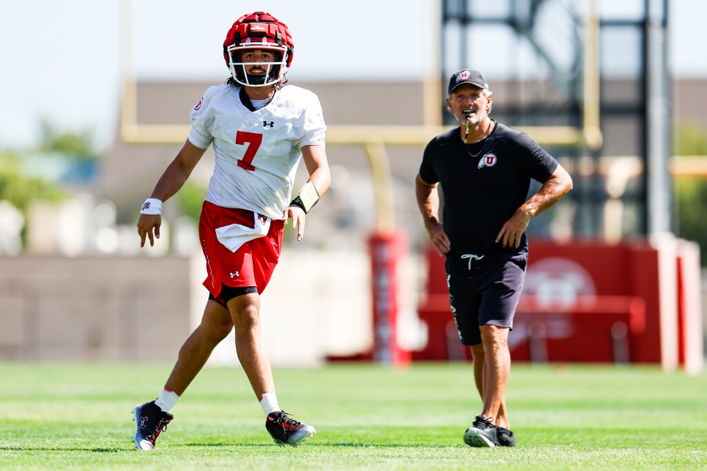 (Hunter Dyke | Utah Athletics) Utah Utes Football opened its 2022 fall camp on Wednesday. Quarterback Cam Rising, left, and head coach Kyle Whittingham, right, have high hopes for the Utes this season.