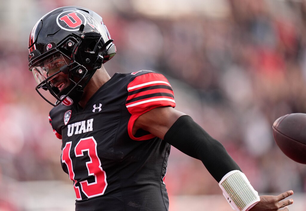 (Francisco Kjolseth  |  The Salt Lake Tribune) Utah Utes quarterback Nate Johnson (13) celebrates his 59-yard run touchdown as the Utah Utes host the Arizona State Sun Devils in NCAA football in Salt Lake City on Saturday, Nov. 4, 2023.