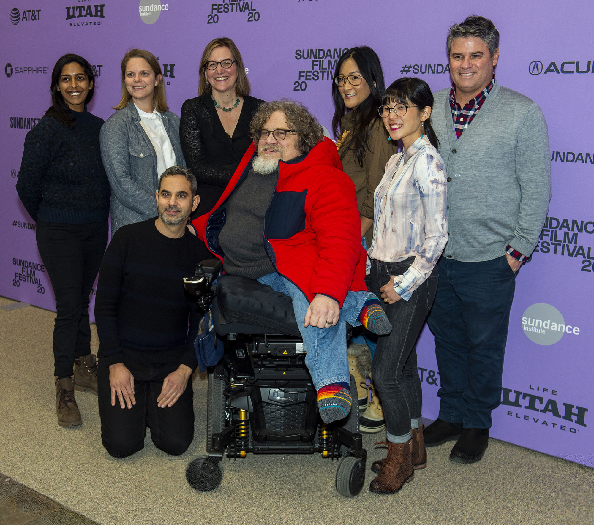 (Rick Egan  |  The Salt Lake Tribune)     People from the film pose for a photo with Nicole Newnhan, director/producer, and Jim LeBrecht director/producer/subject, on the red carpet for the film "Crip Camp", the opening night film of the 2020 Sundance Film Festival, at the Eccles Theatre in Park City, Thursday, Jan. 23, 2020.