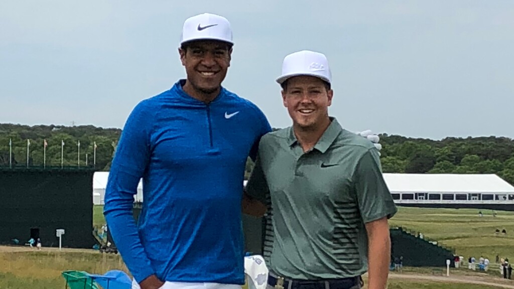 (Kelsey Chugg photo) BYU golfer Rhett Rassmussen, right, shown with fellow Utahn Tony Finau during a U.S. Open practice round, sits in second individually in an NCAA golf regional in Pullman, Wash., after Tuesday's round.