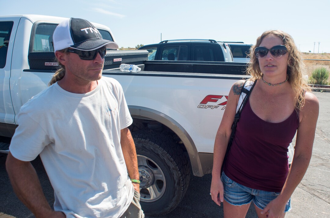 (Rick Egan  |  The Salt Lake Tribune)   Leila and Chad Hintze found out during a community meeting that their cabin burned to the ground in the fire. They're pictured in Fruitland, Tuesday, July 10, 2018.