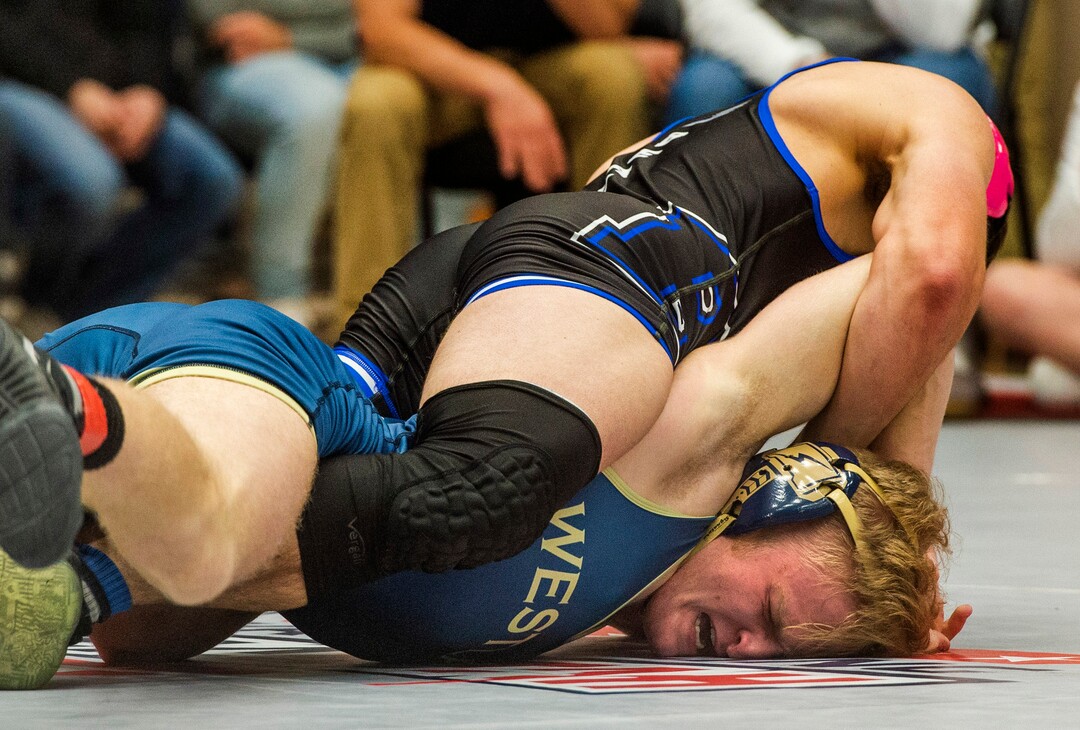 (Rick Egan | The Salt Lake Tribune) Jacob Finlinson (Westlake) wrestles Brian Evans (Beaver) in the138 division at the High School All Star wrestling event in Orem, on Tuesday, Jan. 12, 2021.