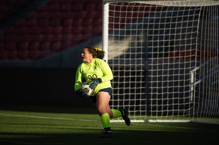 (Francisco Kjolseth  |  The Salt Lake Tribune) Bonneville goalie Abree Beardall makes a save and looks to clear the ball quickly as Olympus and Bonneville compete in their 5A high school girls championship game at Rio Tinto Stadium in Sandy on Friday, Oct. 23, 2020. Bonneville went on to win 1-0 in overtime.