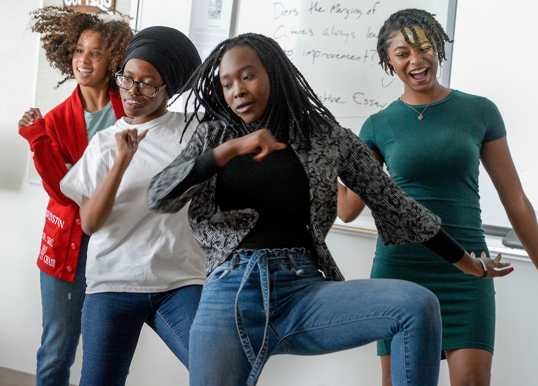 (Leah Hogsten  |  The Salt Lake Tribune) From left to right, Olivia Winston, Aguilera Niyonkuru, Rosine Nibishaka and Summer Goodin, members of East High School's Black Student Union, end their Sept. 18 meeting with a group dance.