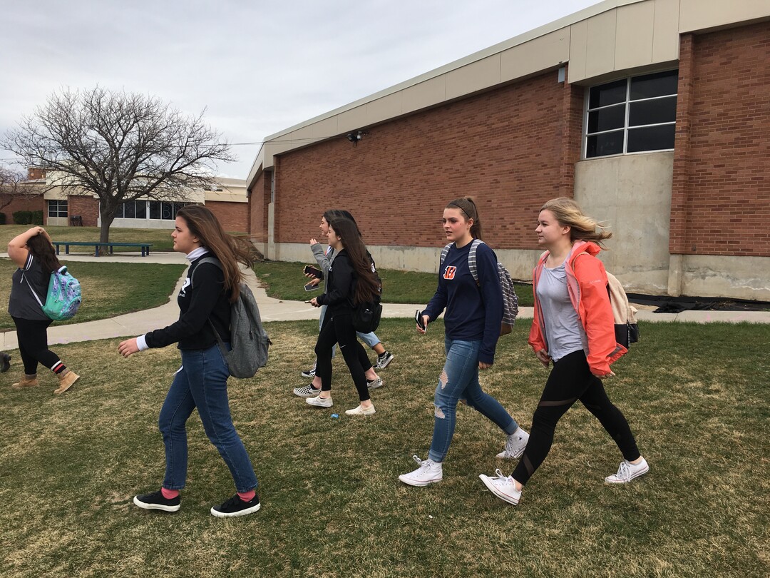 (Scott Sommerdorf  |  The Salt Lake Tribune) Students at Brighton High School in Cottonwood Heights start to gather to participate in a nationwide demonstration for better gun safety laws on March 14, 2018.