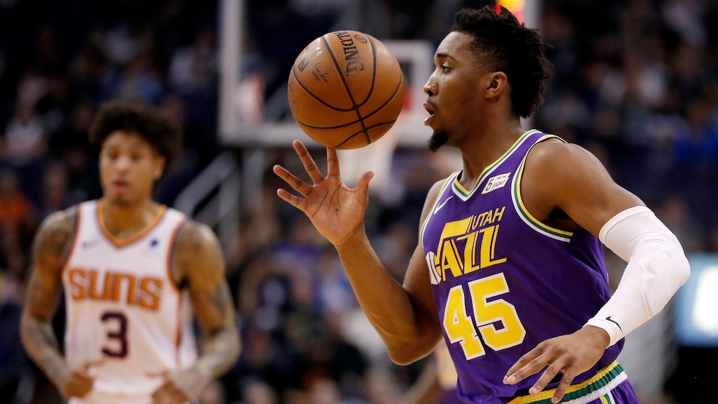 Utah Jazz guard Donovan Mitchell (45) loses the ball during the first half of an NBA basketball game against the Phoenix Suns, Wednesday, March 13, 2019, in Phoenix. (AP Photo/Matt York)