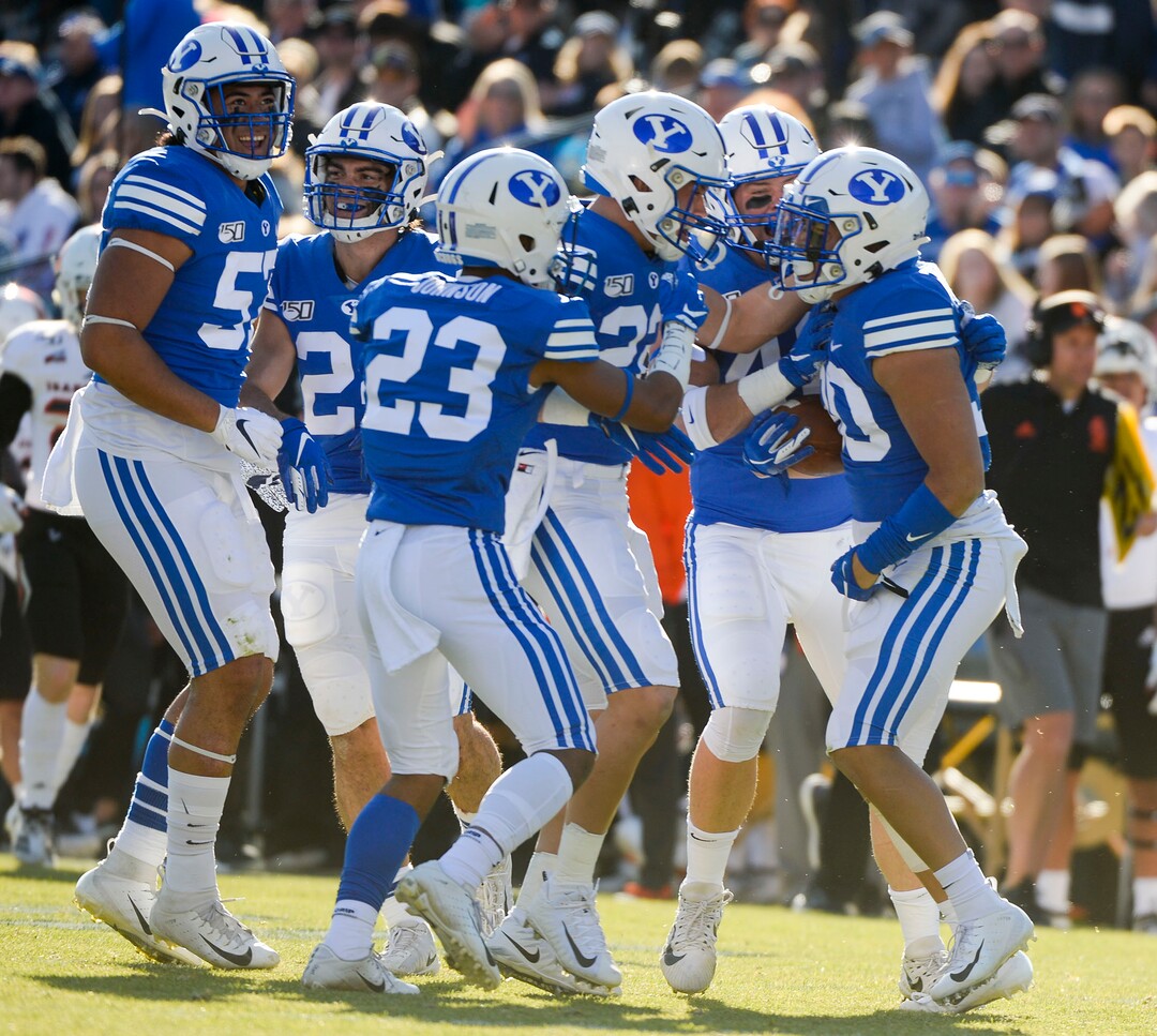(Leah Hogsten  |  The Salt Lake Tribune) Brigham Young Cougars defensive back Will Watanabe (30) pulls in a blocked punt as Brigham Young University takes on Idaho State, Saturday, Nov. 16, 2019 at LaVell Edwards Stadium.