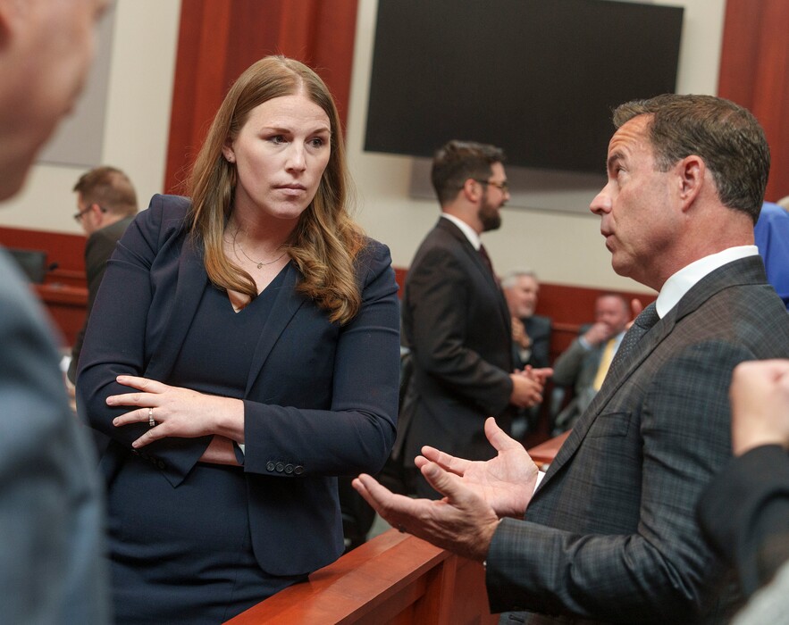 Attorney Taylor Meehan talks with Utah House Speaker Brad Wilson during a break in oral arguments for a case challenging the state's congressional districts before the Utah Supreme Court in Salt Lake City, Tuesday, July 11, 2023. (Leah Hogsten/The Salt Lake Tribune via AP, Pool)