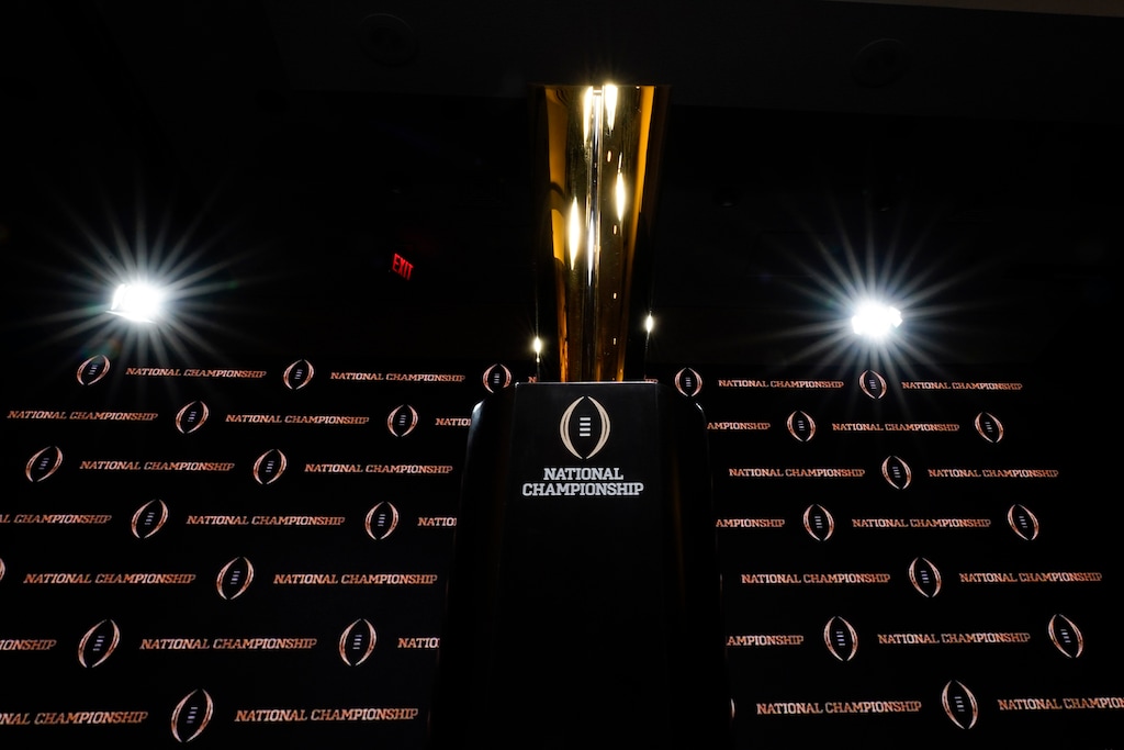 FILE - In this Sunday, Jan. 12, 2020, file photo, the trophy is displayed before a news conference for the NCAA College Football Playoff national championship game, in New Orleans. The more people who get angry with the College Football Playoff, the more likely it is to change. (AP Photo/David J. Phillip, File)
