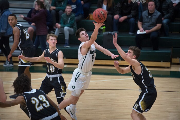 (Scott Sommerdorf   |  The Salt Lake Tribune)   Seth Williams slices to the hoop during first half play as Olympus defeated Highland 70-49, Friday, January 19, 2018.