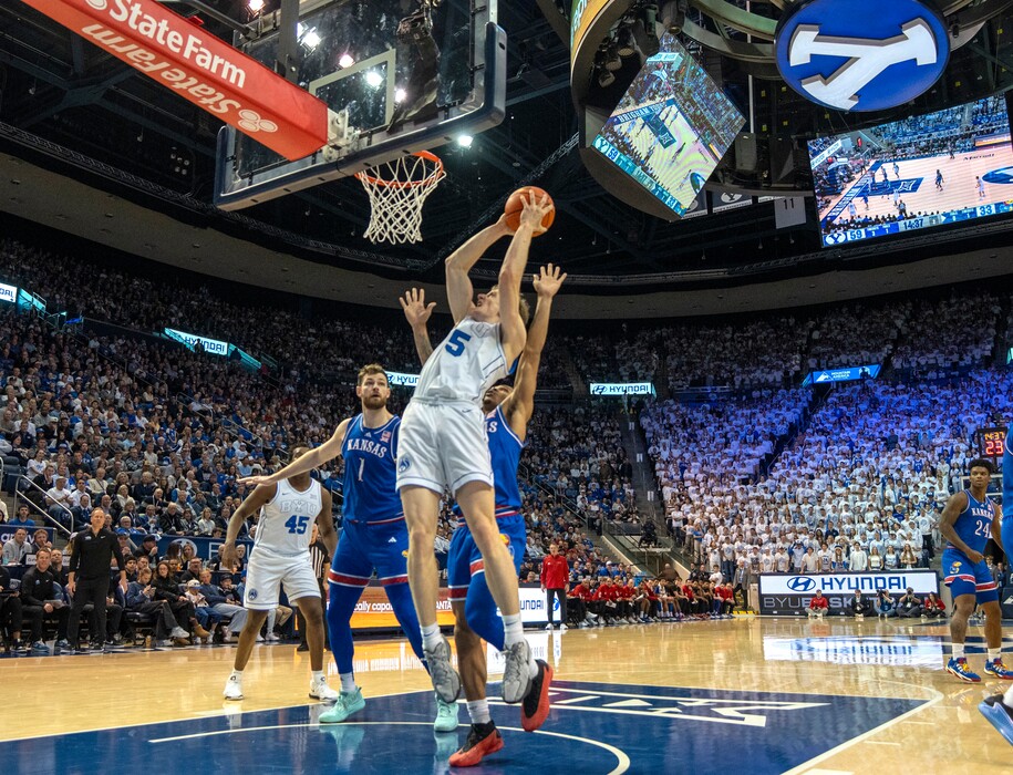(Rick Egan | The Salt Lake Tribune) Brigham Young Cougars forward Richie Saunders (15) scores, in Big 12 basketball action between the Brigham Young Cougars and the Kansas Jayhawks, at the Marriott Center, in Provo, on Tuesday, Feb 18, 2025.